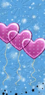 Pink heart balloons on blue snowy background with stars.