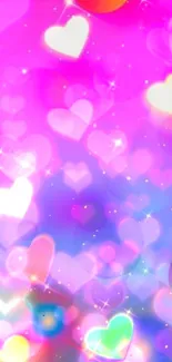 Vibrant heart bokeh wallpaper with pink and rainbow colors.