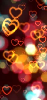 Colorful heart bokeh wallpaper with red and orange hues.