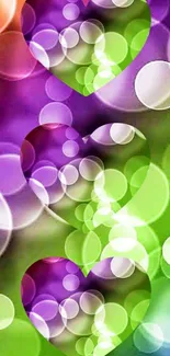 Vibrant bokeh wallpaper with hearts and colorful lights.