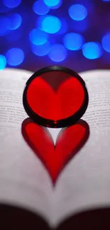 Heart shadow on book with blue bokeh lights.