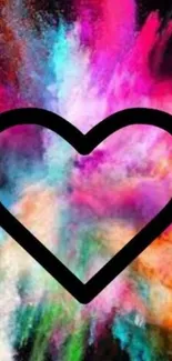 Vibrant heart with colorful explosion on black background wallpaper.