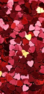 Heart-shaped confetti in shades of red and pink creating a romantic mobile wallpaper.