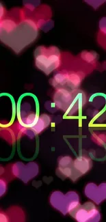 Green countdown with glowing pink hearts background.