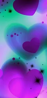 Vibrant pink and green heart-themed smartphone wallpaper.