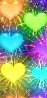 Colorful heart fireworks wallpaper with vibrant hues.