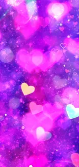 Colorful hearts in a purple galaxy wallpaper.