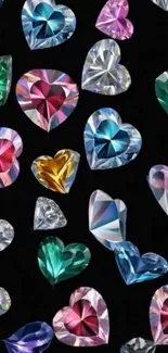 Colorful heart-shaped gemstones on a black background wallpaper.