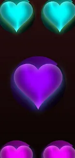 Vibrant neon heart design on a dark background.