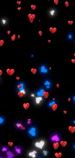 Colorful glowing hearts on a black background.