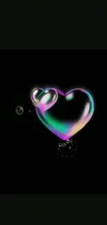 Colorful neon heart glows on a dark background.