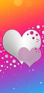 Vibrant gradient wallpaper with abstract hearts and dots.