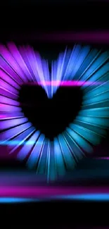 Heart-shaped light design in vibrant colors on a black background.