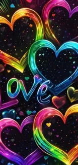 Colorful neon hearts with 'Love' text on black background.
