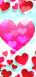 Vibrant red and pink hearts on a blue background wallpaper.