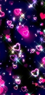 Vibrant neon pink hearts on a dark blue background.