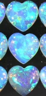 Nine vibrant opal heart shapes on a dark background.