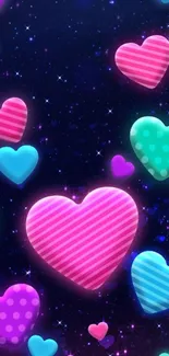 Vibrant mobile wallpaper with colorful floating hearts on a dark starry background.