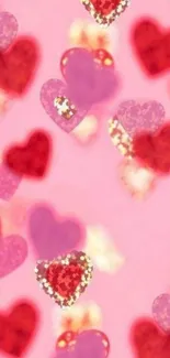 Colorful wallpaper with red and pink hearts.