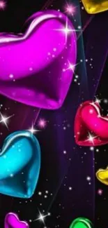 Colorful heart pattern wallpaper with glossy hearts on a dark background.