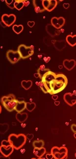 Vibrant red and yellow glowing heart pattern wallpaper.