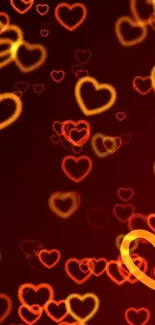 Mobile wallpaper with glowing heart patterns on a dark red background.