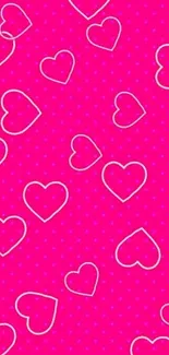 Vibrant pink wallpaper with heart patterns.