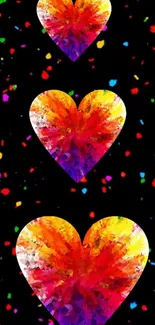 Vibrant hearts pattern on dark background for mobile wallpaper.