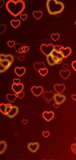 Vibrant heart pattern with glowing red and orange hearts on a dark background.