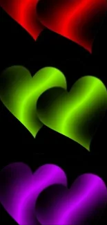 Colorful glowing hearts on a dark background