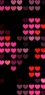 Mobile wallpaper with colorful heart pattern on a black background.