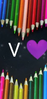 Colorful pencils forming a heart with a 'V' on black background wallpaper.