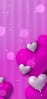 Pink hearts mobile wallpaper with vibrant design.