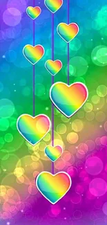 Vibrant rainbow hearts with bokeh background on mobile wallpaper.