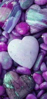 Purple heart-shaped stones against colorful rocks.