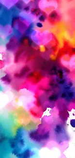 Vibrant watercolor hearts on an abstract colorful palette.