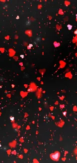 Red heart pattern wallpaper on black background, perfect for romantic theme.