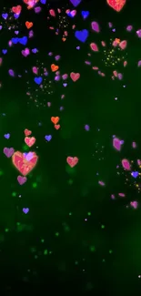 Floating colorful hearts on a green background wallpaper.