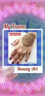 Vibrant henna design with pink frame on mobile wallpaper.