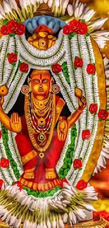 Vibrant Hindu goddess idol with colorful flowers.