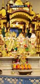 Bright Hindu temple scene with deities and golden decor.