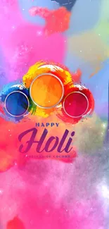 Colorful Holi festival wallpaper with vibrant splashes of pink and yellow hues.