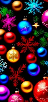 Colorful holiday ornaments and snowflakes on black background.