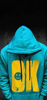 Vibrant blue hoodie with yellow OK design on dark background.