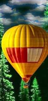 Yellow hot air balloon over a lush forest background.