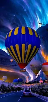 Colorful hot air balloons floating under an aurora-lit sky.