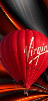 Vibrant red hot air balloon over abstract pattern background.