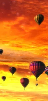 Hot air balloons flying at sunset with vivid orange sky.