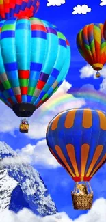 Colorful hot air balloons against a blue sky and mountain backdrop.