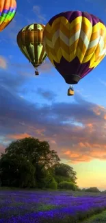 Vibrant hot air balloons floating in a blue sky over a lush landscape.